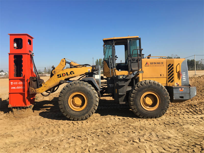 Rapid impact compaction hammer feet are pressed into the soil