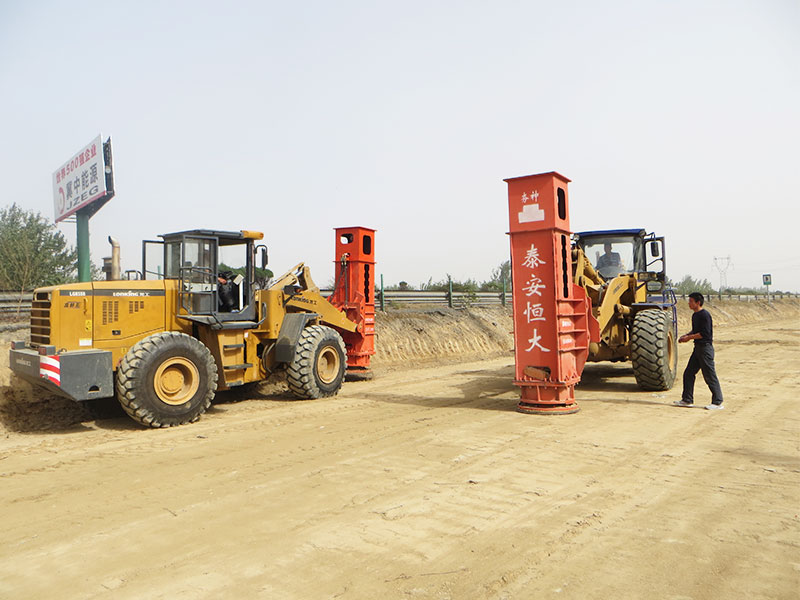 2 rapid impact compactors mounted on the loader handle the subgrade