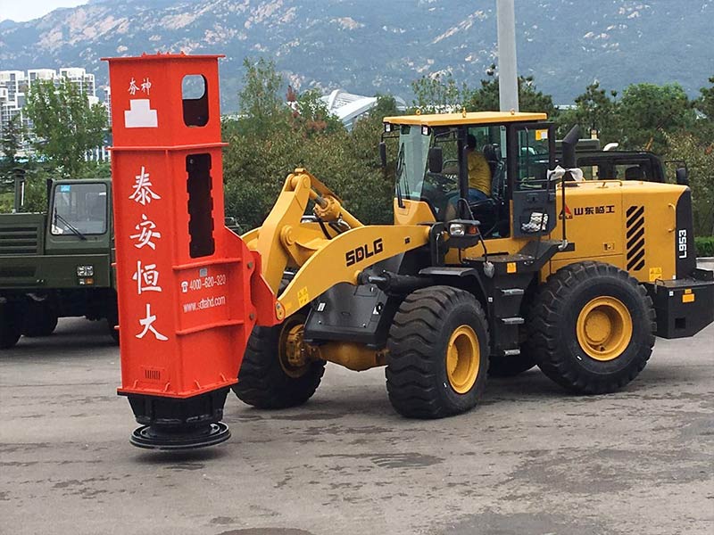 Rapid impact compactor mounted on the loader